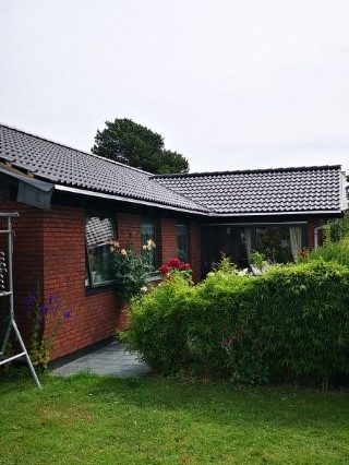 Byggearbejdere på stillads